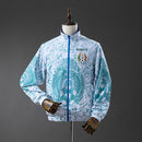 CHAQUETA CORTAVIENTOS REVERSIBLE MEXICO 2026 II